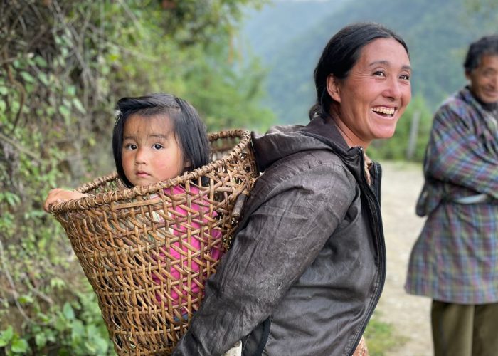 11. Photo C - Dorji Wangmo from Brokser carries her daugher in a tshangkali - Roseleen Gurung